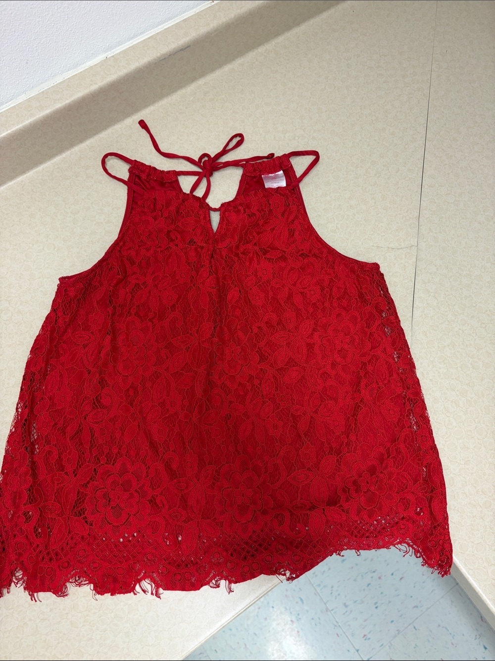 Red floral Lace Sleeveless Tie-Back Top. Size M(7-9)
